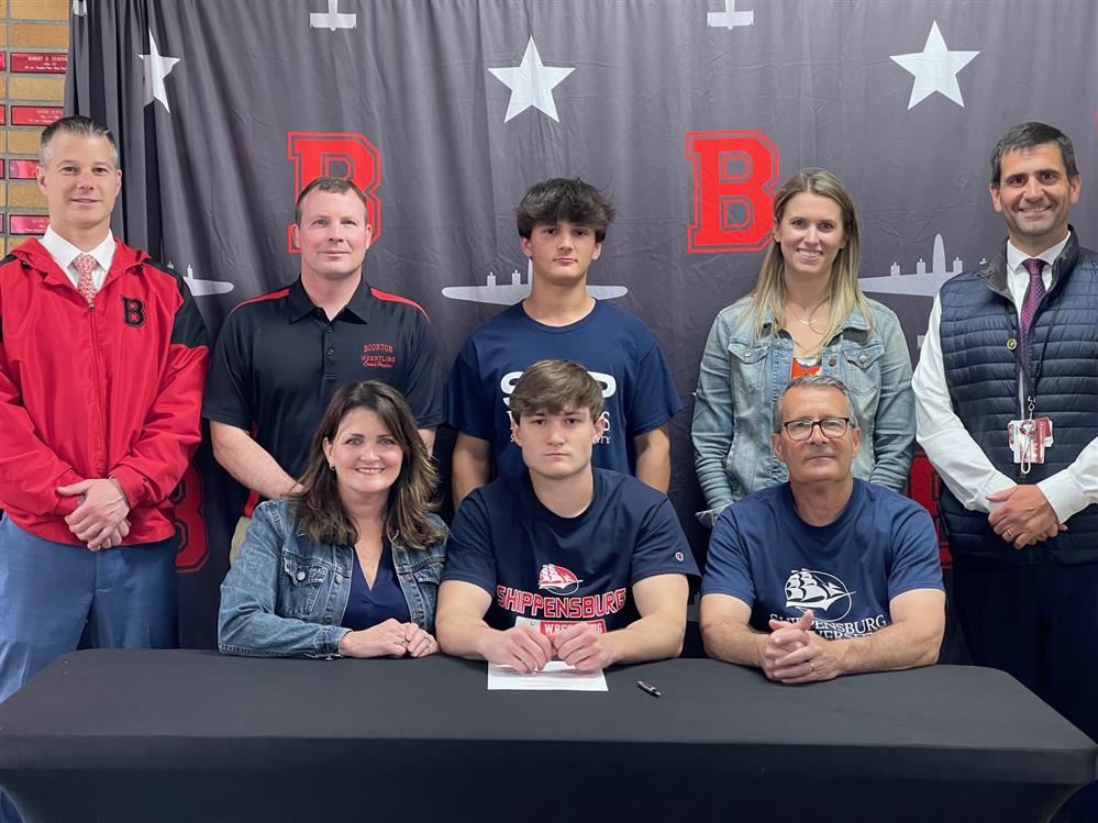  Liam Bostrom signs his letter of commitment to Shippensburg University Wrestling.